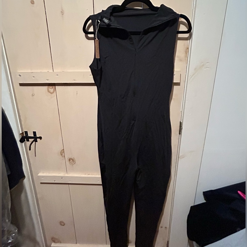 Skims one piece zip up cat suit in Onyx XL
